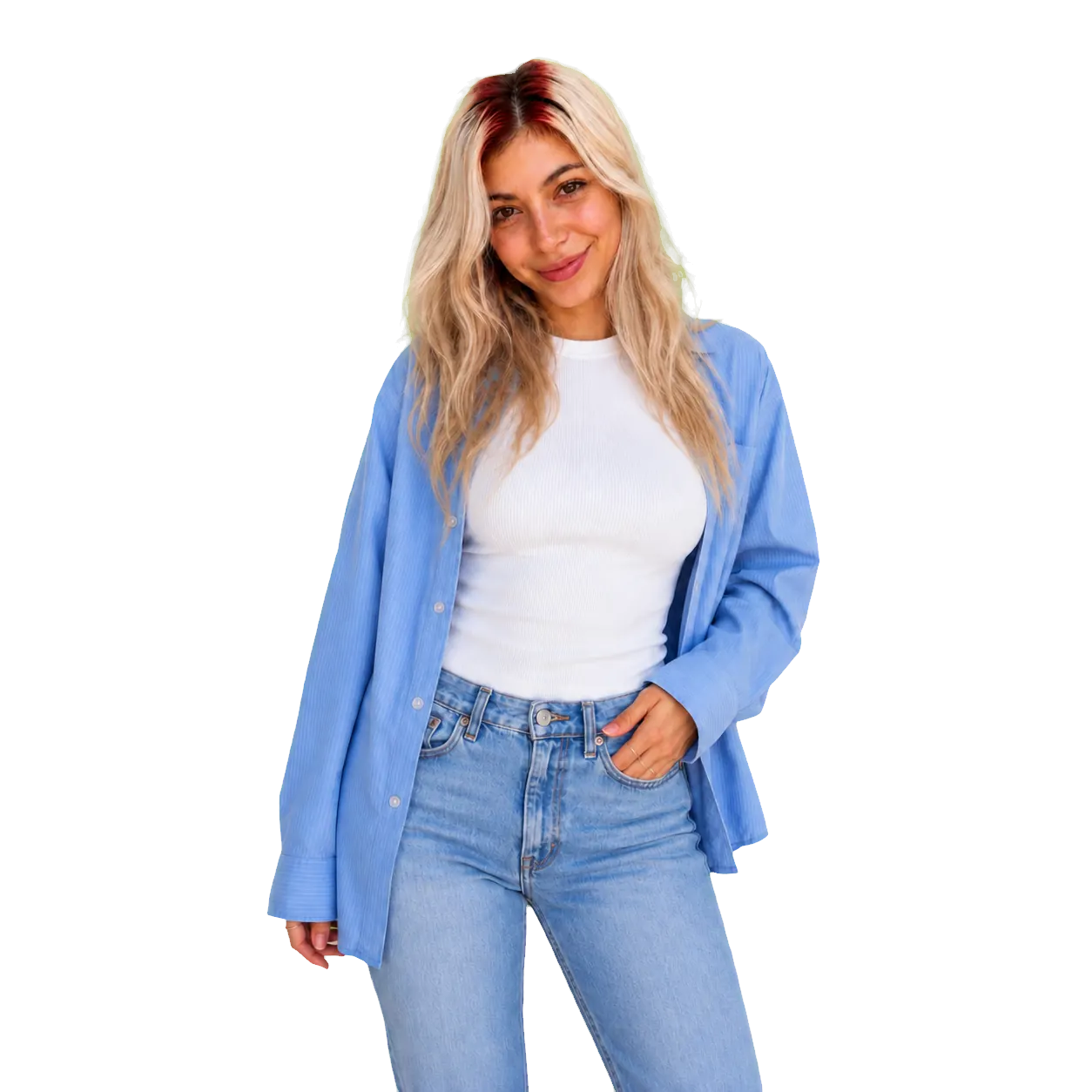 Woman with long blonde hair and deep red ghost roots wearing a pale blue overshirt.
